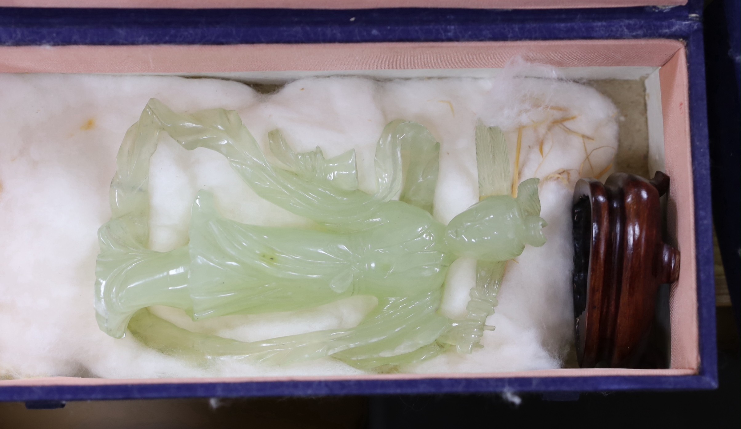 Four assorted boxed of jades and bowenite jades and a blanc de chine figure, 26.5cms high